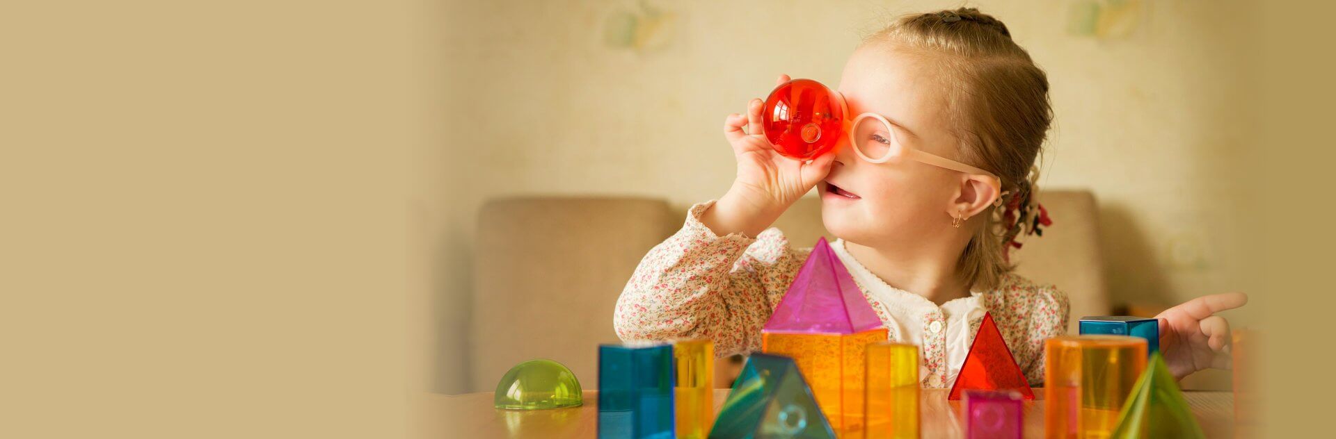 kid playing with shapes