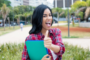 therapist staff showing thumb in outdoors